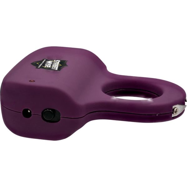 Purple personal safety alarm with keychain and button. Portable and discreet for self-defense.