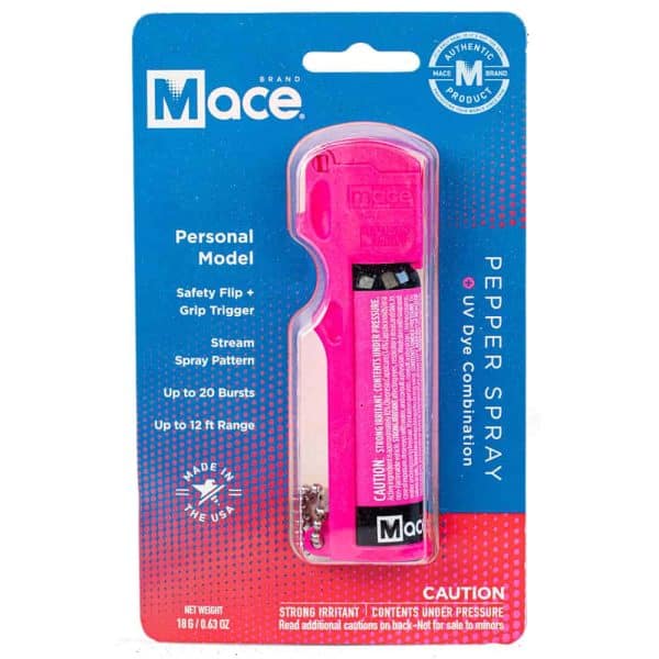 Pink Mace pepper spray in packaging, personal model with safety flip and grip trigger, stream spray, up to 12 ft range.