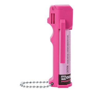 Pink pepper spray canister with keychain for personal safety and self-defense.
