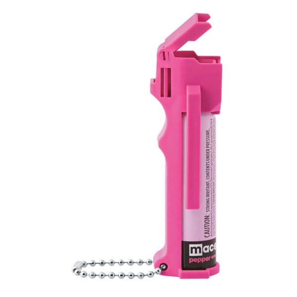 Pink pepper spray with keychain for personal safety and security.