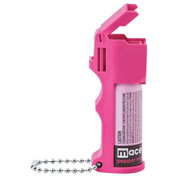 Pink pepper spray with keychain attachment for personal safety.