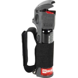 Mace brand pepper spray with ergonomic grip and safety cap for personal defense in emergencies.