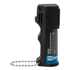 Black pepper spray canister with chain for personal safety and self-defense.