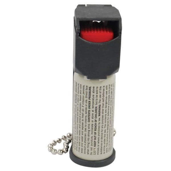 Pocket-sized pepper spray canister with safety cap and keychain, ideal for personal protection and self-defense.