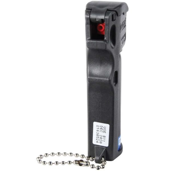 Compact black keychain pepper spray for personal safety and self-defense.