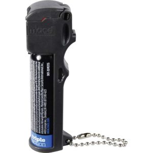 Black pepper spray canister with safety lock and keychain for personal security.