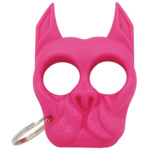 Pink dog-shaped self-defense keychain with sharp ears and circular eye holes.