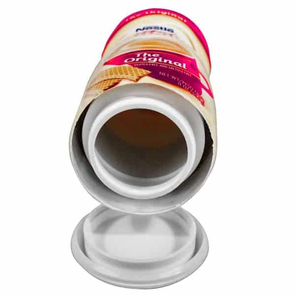 Open cylindrical box of gluten-free, lactose-free wafer snacks with lid removed.