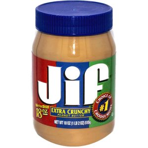 Jar of Jif extra crunchy peanut butter, 18 oz with blue lid and colorful label. Perfect for sandwiches and snacks.