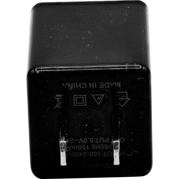 Black wall charger plug with visible prongs and Made in China text on the surface.