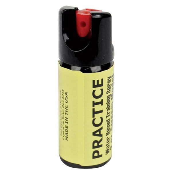 Training pepper spray canister with red nozzle and yellow label for practice use. Made in the USA.