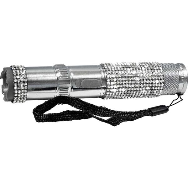 Silver flashlight adorned with crystals and a black strap for secure handling. Stylish and functional lighting tool.