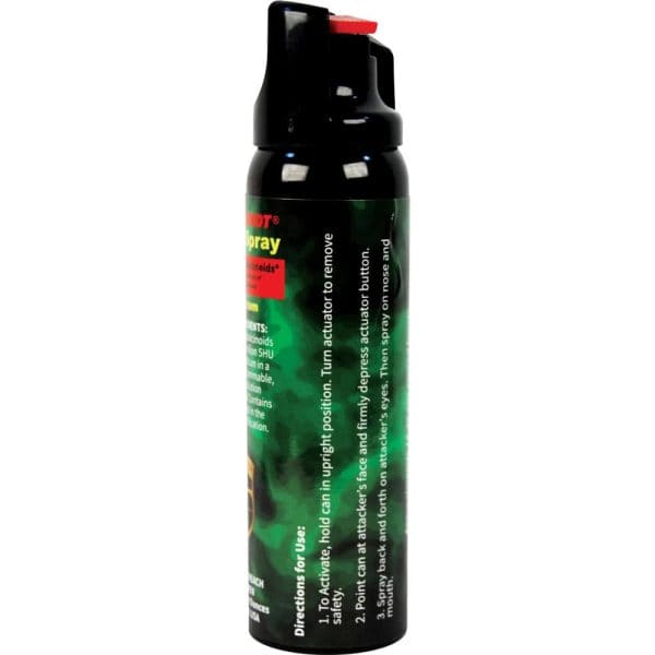 Black and green pepper spray can with safety instructions and a red nozzle.