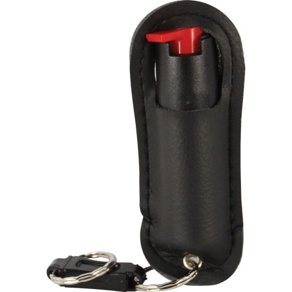 Black pepper spray in holder with keyring attachment, ideal for personal safety and easy access.
