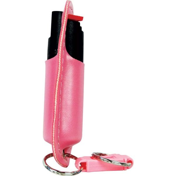 Pink pepper spray keychain for self-defense, featuring a protective holder with keyring attachment.