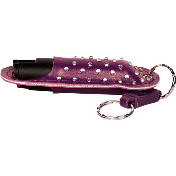 Purple studded leather pepper spray holder with keychain ring.