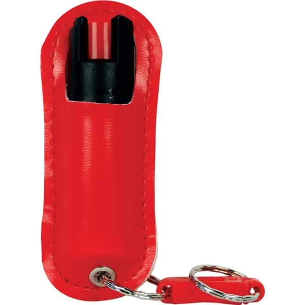Red pepper spray keychain for personal safety protection in a compact design.