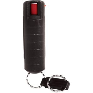 Keychain pepper spray in black casing with safety lock, ideal for personal self-defense.