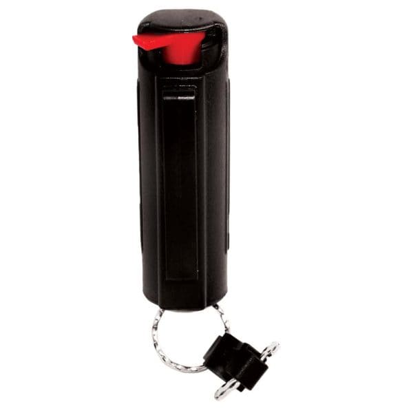 Black pepper spray keychain with red safety tab for personal self-defense.