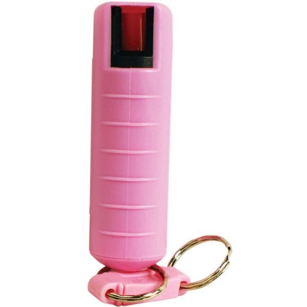 Pink pepper spray keychain for self-defense and personal safety. Compact and portable for convenient protection.