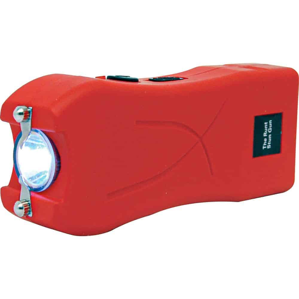 Red compact stun gun for self-defense, equipped with a bright flashlight for safety and illumination.