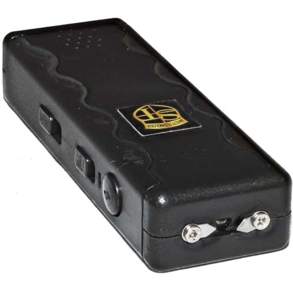 Black stun gun for self-defense with a safety logo, featuring power switches and metal probes.