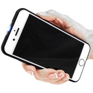Hand holding a black smartphone with a blank screen, displaying a blue notification light.