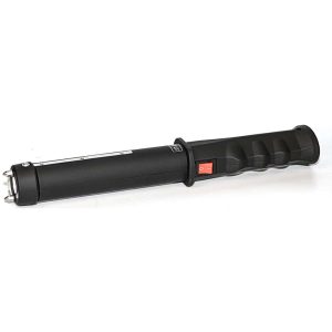 Black handheld electric cattle prod with red switch on a white background.