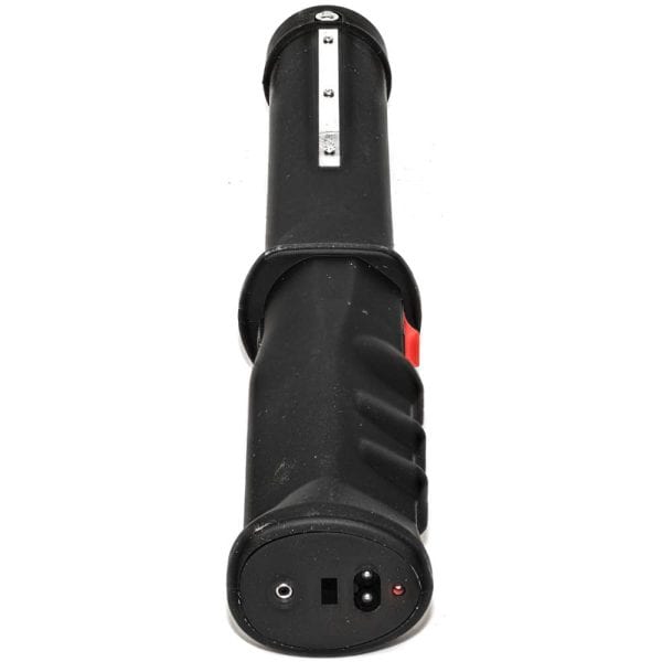 Close-up of a black handheld power tool with grip handle and red button, isolated on white background.
