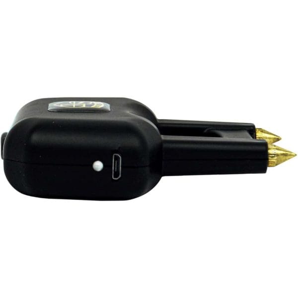 Black handheld stun gun with gold prongs and charging port, side view.