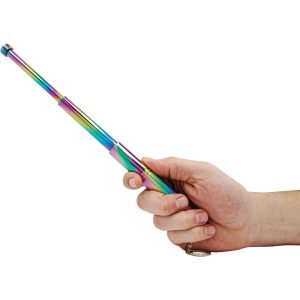Hand holding a rainbow telescopic metal baton with a keychain attached, against a white background.