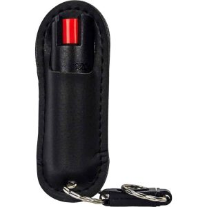 Black leather-covered pepper spray with keychain for personal safety.