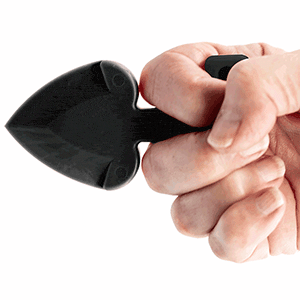 Hand holding a black shovel-shaped gardening tool, showcasing grip ergonomics and design on a white background.